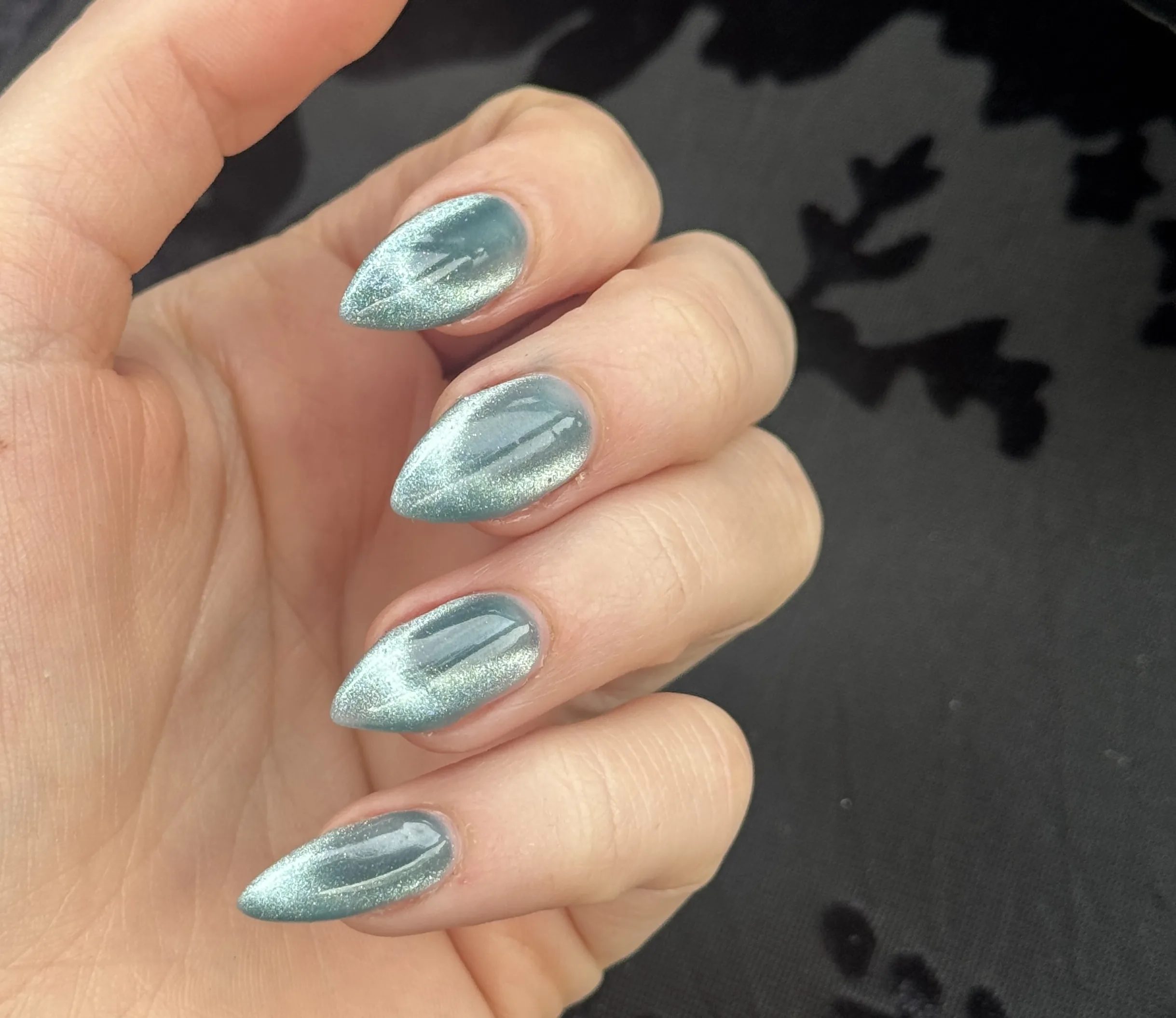 Pale mint cat-eye stiletto nails — Minack Beauty nail work