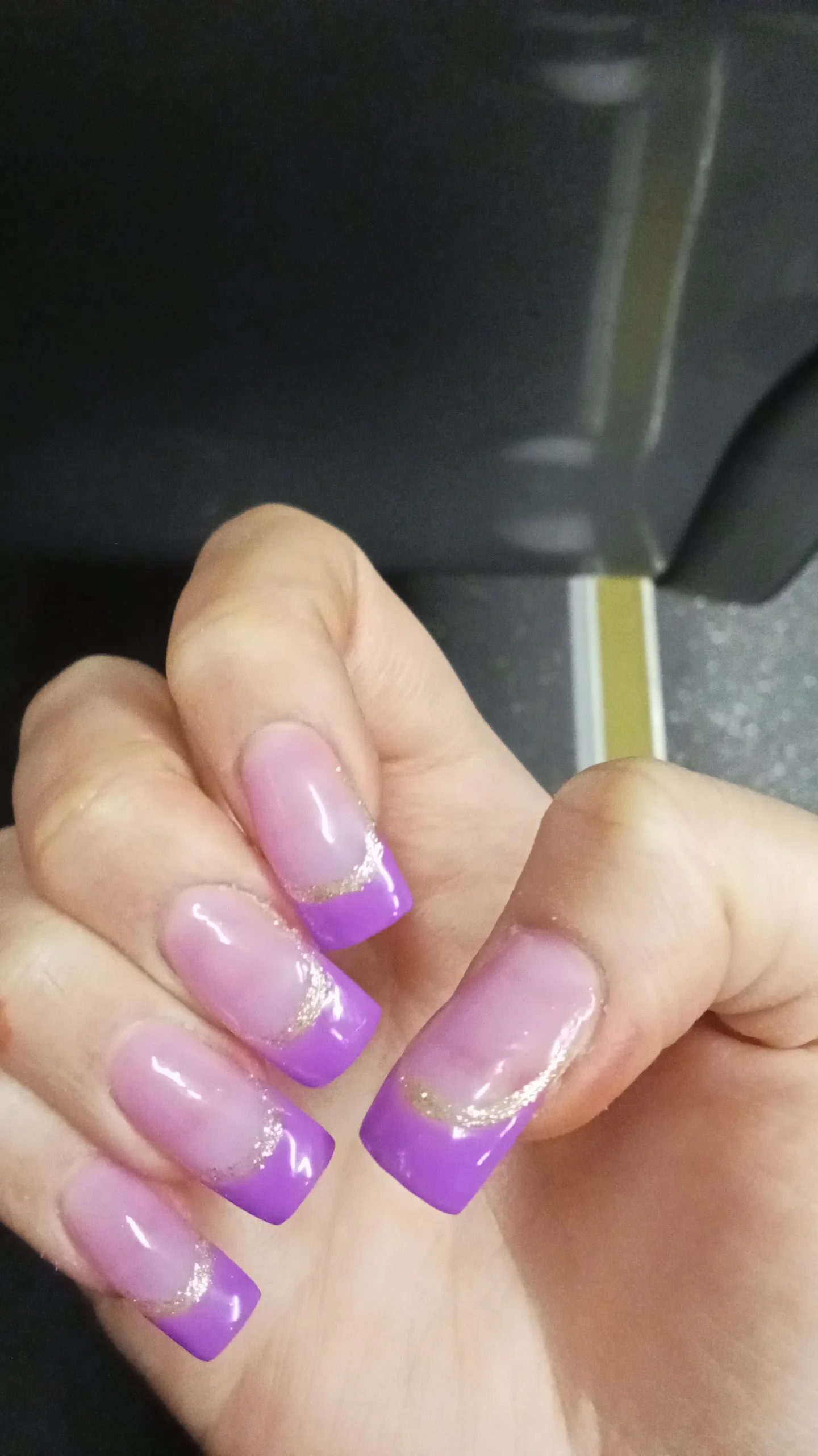 Lilac-to-purple ombre square tips with gold glitter — Minack Beauty nail work